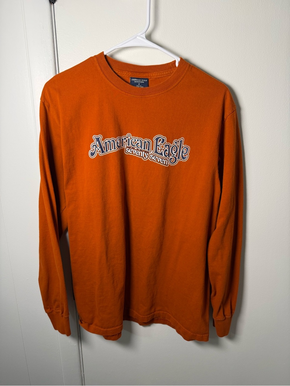 American Eagle Men’s Long‑Sleeve Graphic Tee | Orange Seventy Seven | Small |GUC